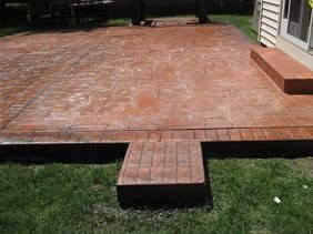 red stone patio in yard